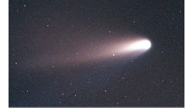 The comet Hale-Bopp appears in the sky over Merrit