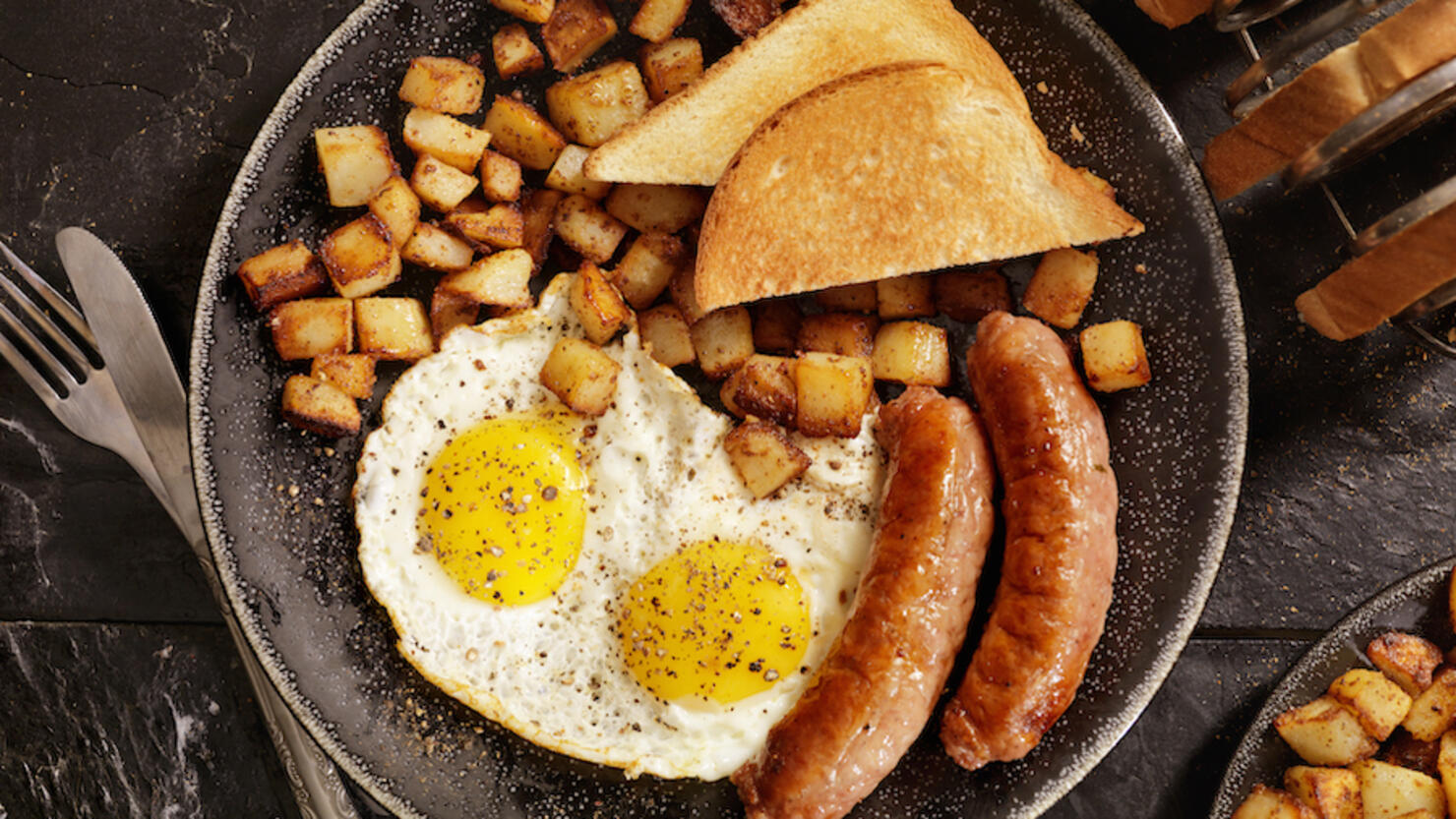 Breakfast with Sunny side up eggs and Sausage