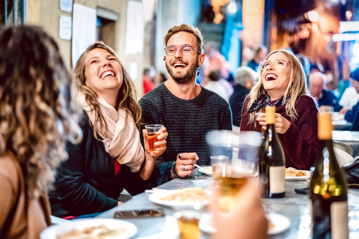 Happy friends having fun drinking white wine at street food festival - Young people eating local plate at restaurant reopening together - Travel and dinning lifestyle concept on azur light neon filter