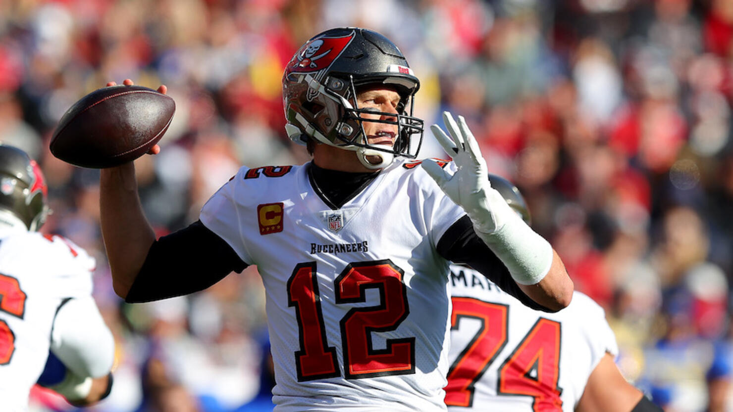 Tampa Bay Buccaneers quarterback Tom Brady (12) tosses the ball