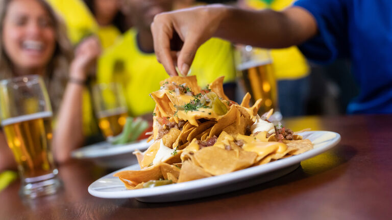Close up on nachos at a sports bar