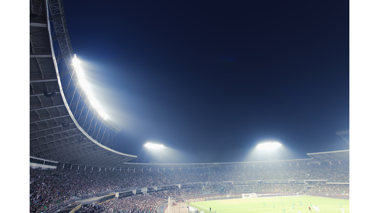 Sports stadium arena game at night