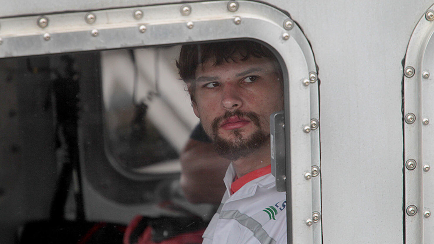 Man Who Survived Boat Sinking, But Lost Mother, Arrives In Boston