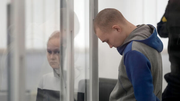 Russian Soldier Gets Harsh Sentence In First Ukraine War Crimes Trial