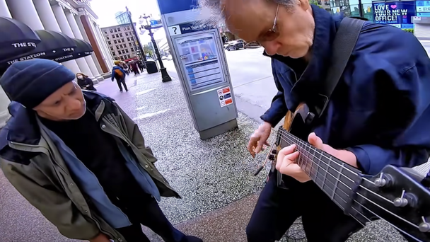 Busker Has Best Reaction After Being Accused Of Faking Guitar Solo