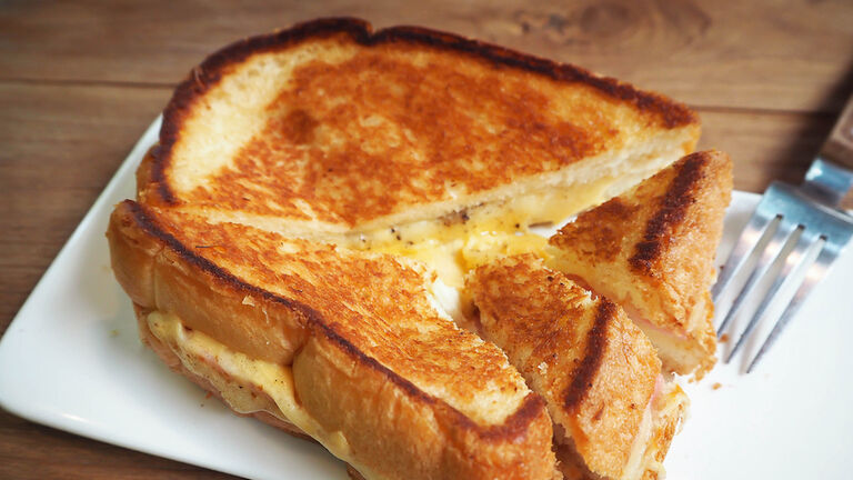 Close-Up Of Grilled Cheese Sandwich In Plate On Table