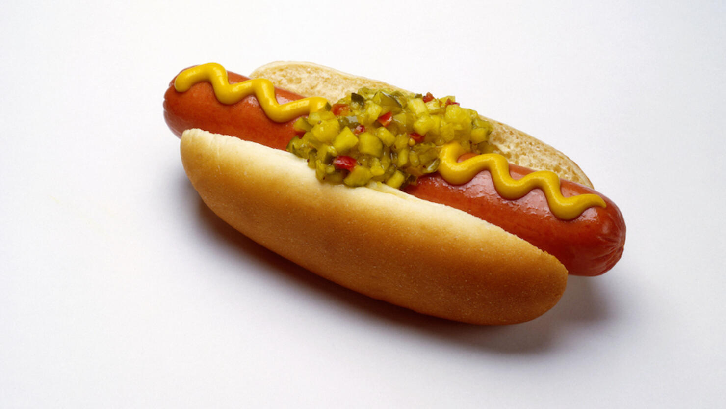 Hot dog with mustard and relish