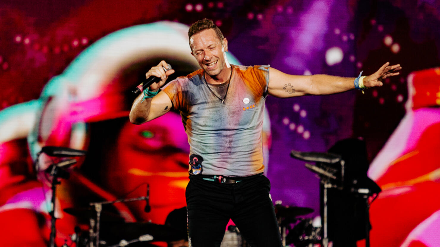 Will Champion of Coldplay, performs during the band's Music of the Spheres  world tour on Thursday, May 12, 2022, at State Farm Stadium in Glendale,  Ariz. (Photo by Rick Scuteri/Invision/AP Stock Photo 