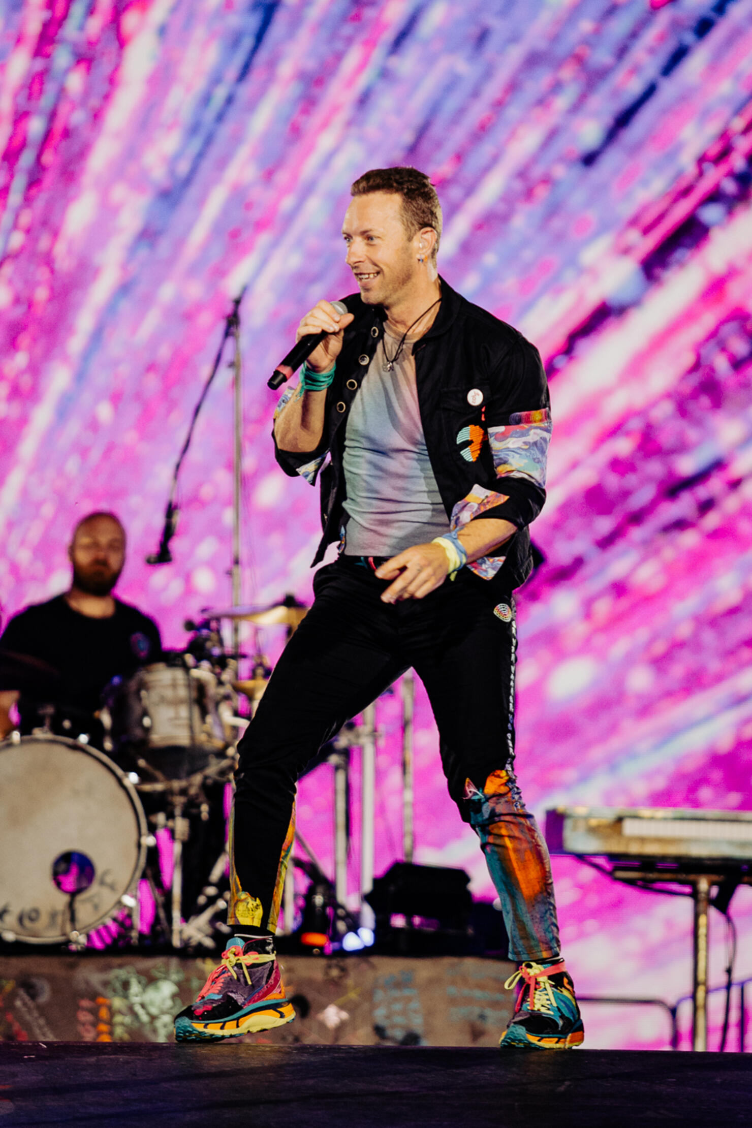 Will Champion of Coldplay, performs during the band's Music of the Spheres  world tour on Thursday, May 12, 2022, at State Farm Stadium in Glendale,  Ariz. (Photo by Rick Scuteri/Invision/AP Stock Photo 