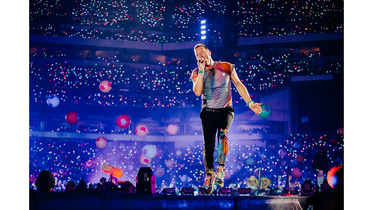 Will Champion of Coldplay, performs during the band's Music of the Spheres  world tour on Thursday, May 12, 2022, at State Farm Stadium in Glendale,  Ariz. (Photo by Rick Scuteri/Invision/AP Stock Photo 