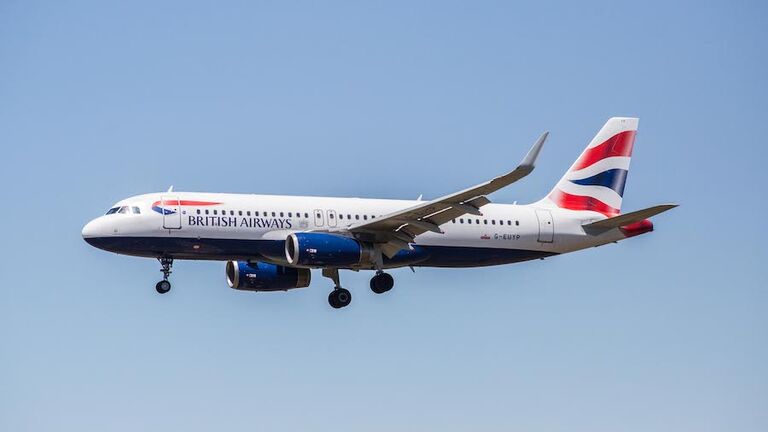 A British Airways airplane is seen landing at El Prat