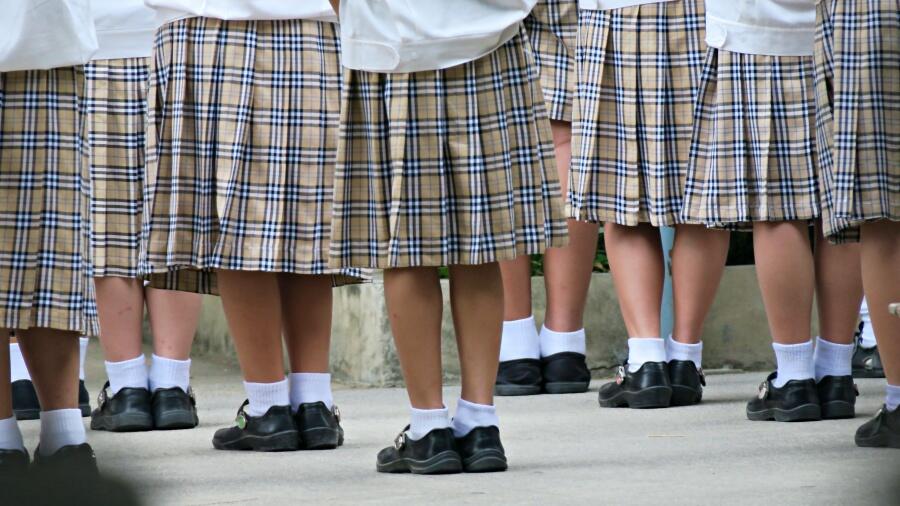 Texas School District Banning Hoodies, Limiting Dresses And Skirts | iHeart