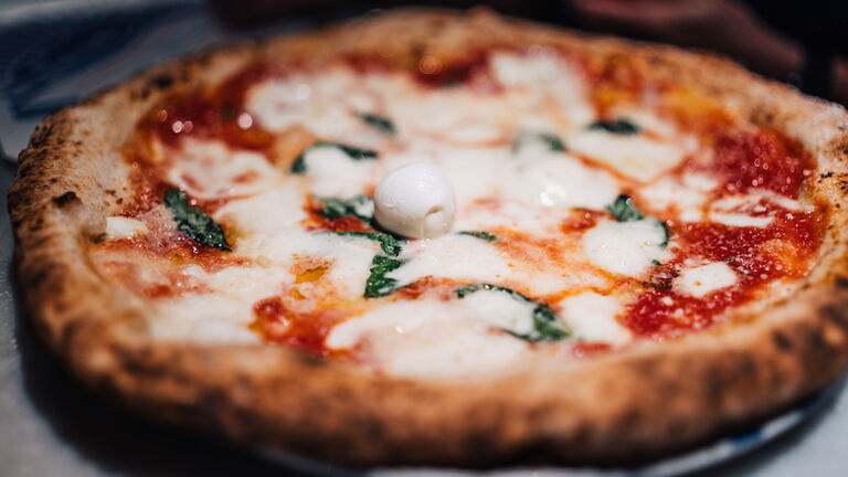 Traditional Neapolitan Pizza Margherita in Naples, Italy