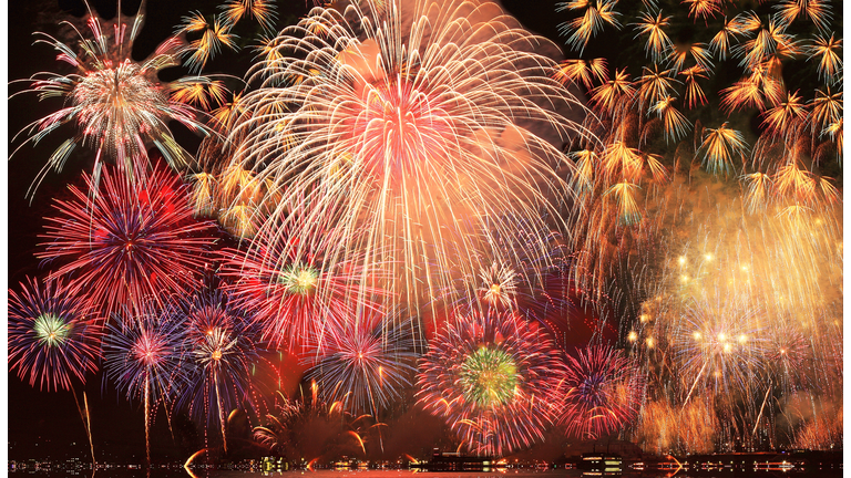 Low angle view of firework display at night