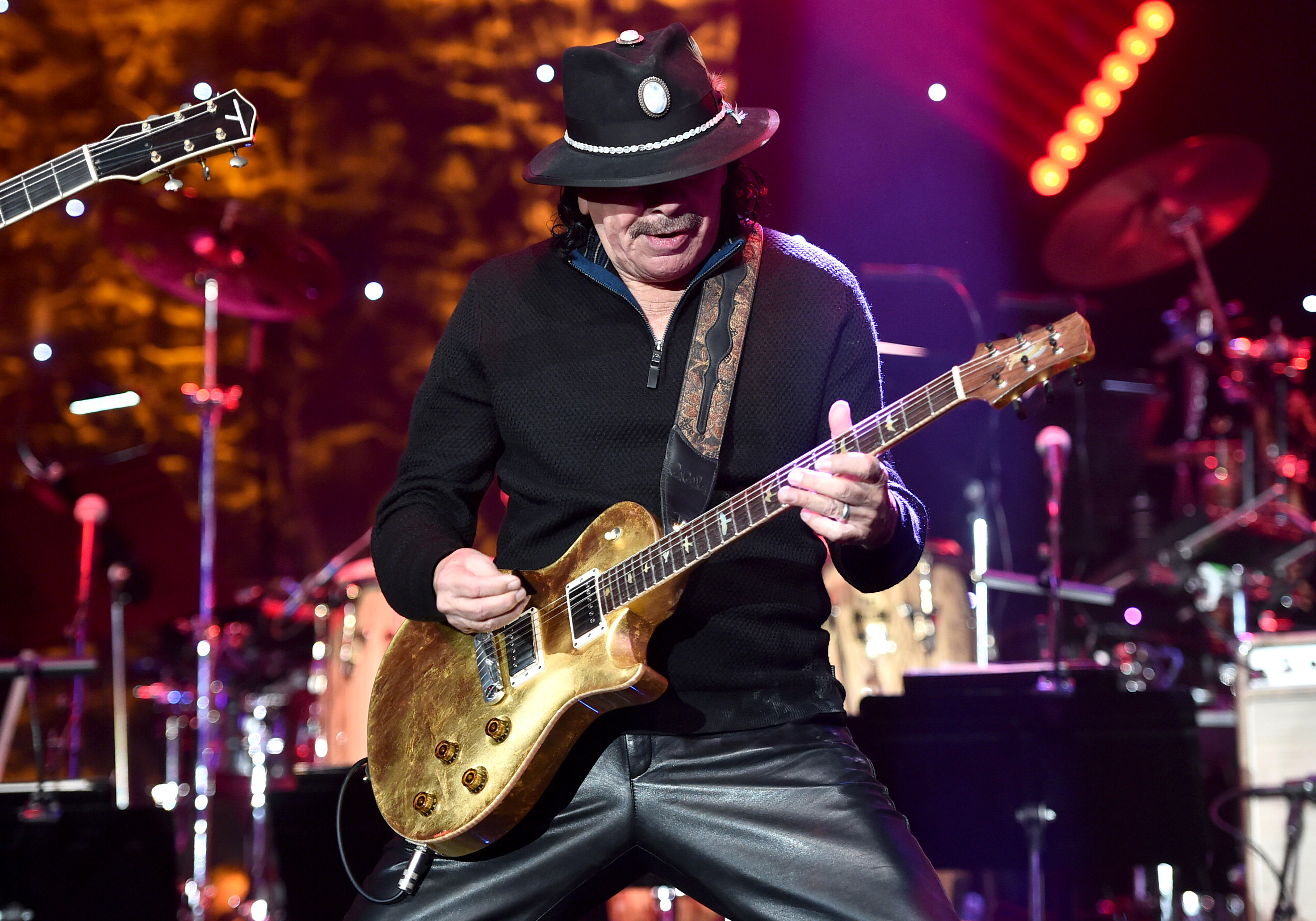 Carlos Santana is 'doing well' after collapsing on stage in