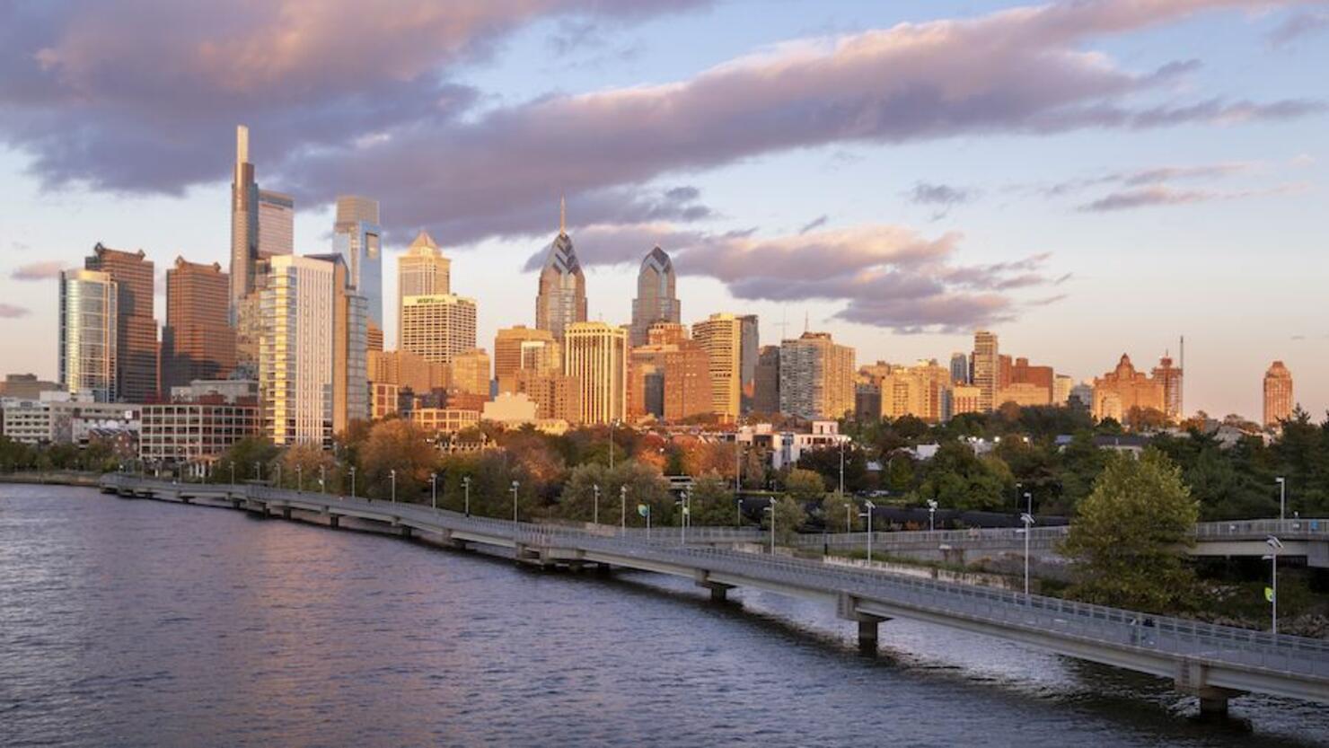 Skyline in autumn behind the Schuylkill River Boardwalk at Sunset, Philadelphia, Pennsylvania, USA