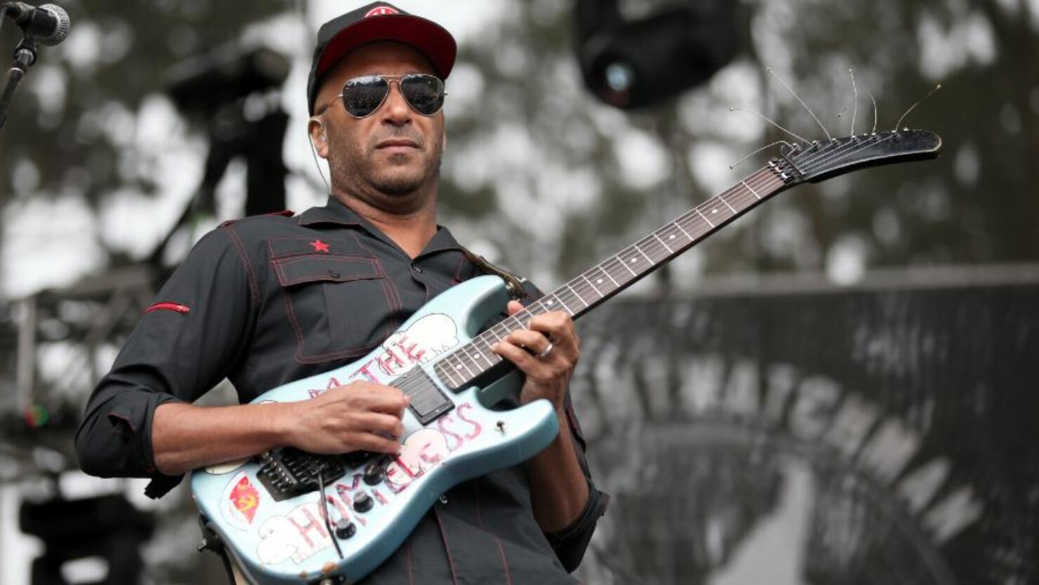 Tom Morello tackled by security during Rage Against the Machine show