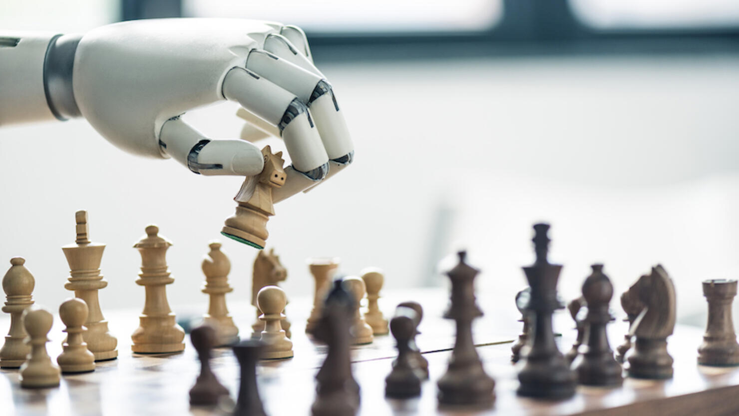 close-up view of robot playing chess, selective focus