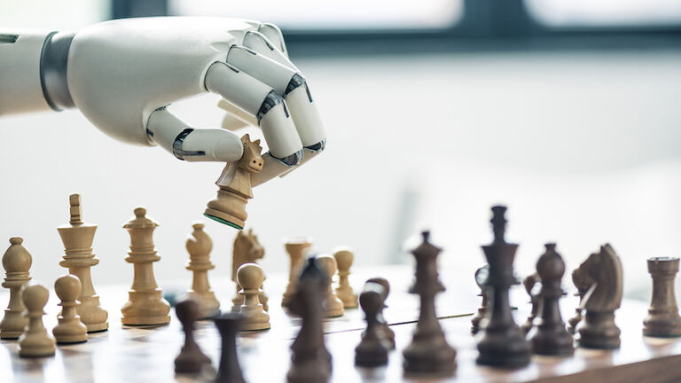 close-up view of robot playing chess, selective focus