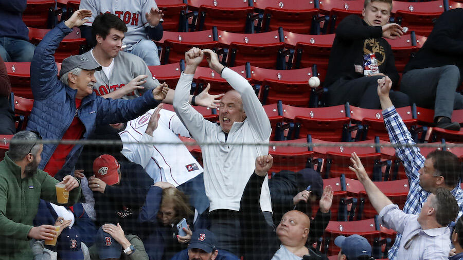 Boston Red Sox fans react to team's 17-4 record while wearing