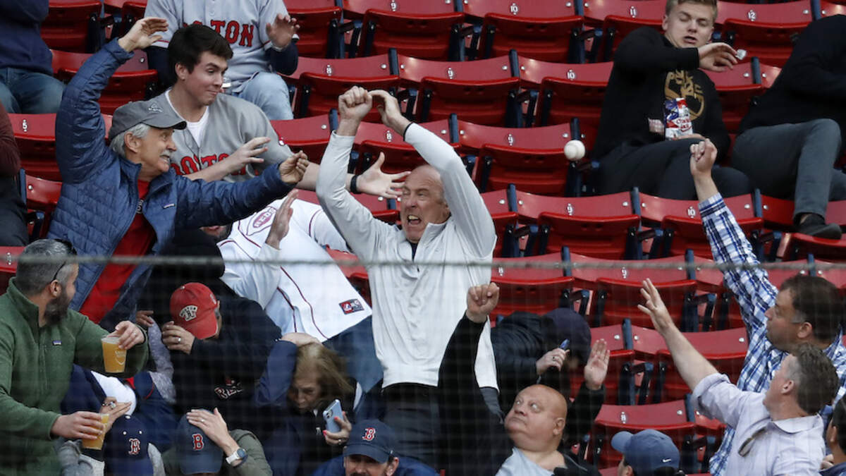 Boston Red Sox fans react to team's 17-4 record while wearing