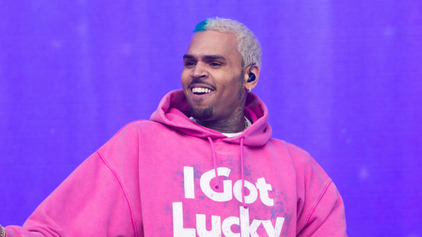 Chris Brown Uplifts Fans After Spicy Meet-And-Greet Photos Go Viral | iHeart