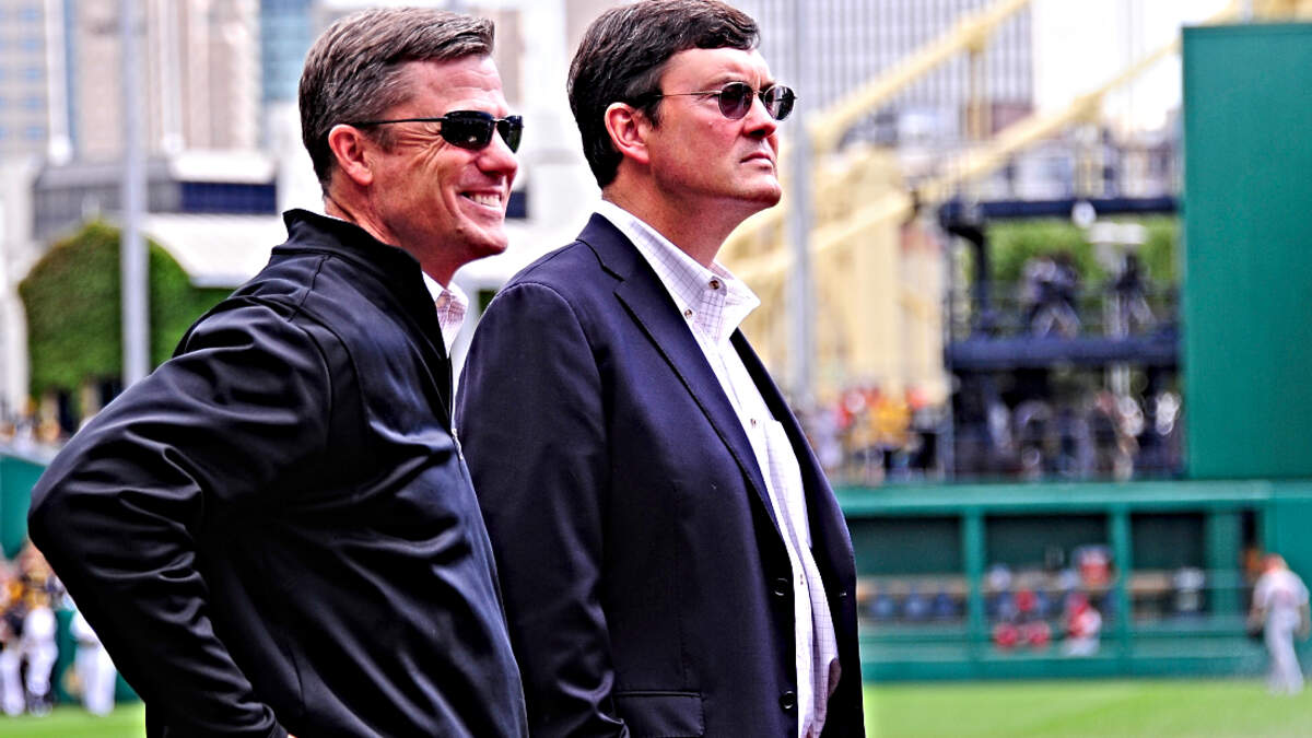 Pirates' Bob Nutting in photo with fan in 'Sell the Team' shirt