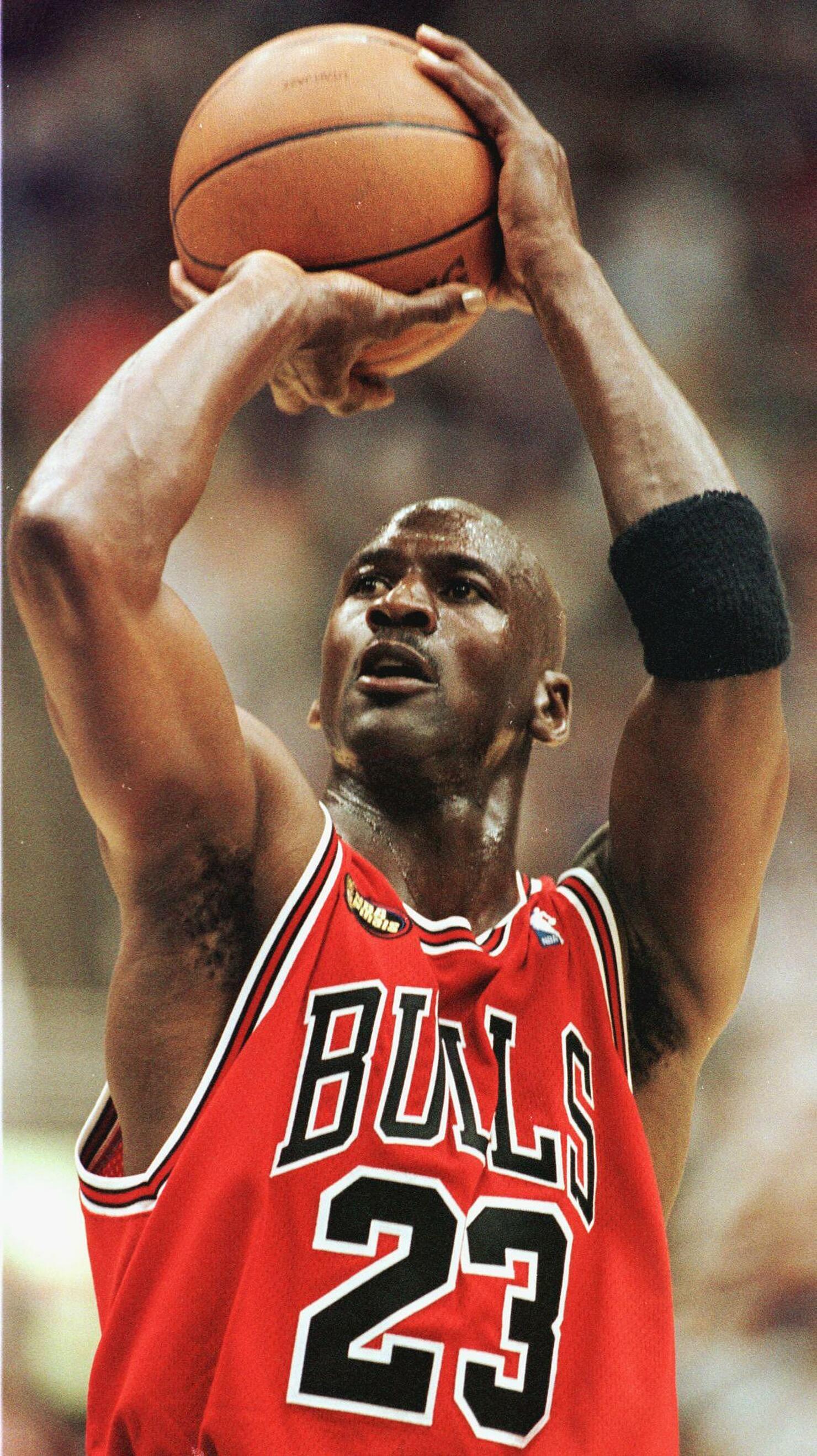 Michael Jordan of the Chicago Bulls takes a shot a