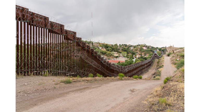 The US/Mexico border fence in Nogales, Arizona USA