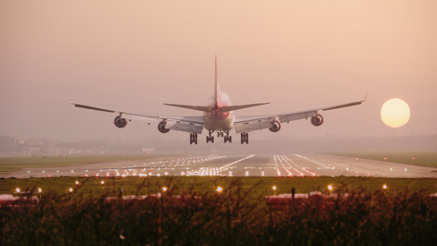 Boeing 747 Landing into sunset