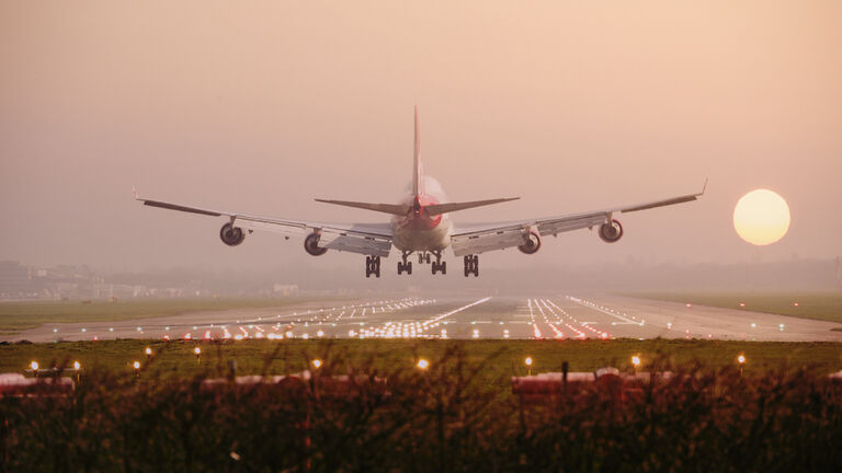 Boeing 747 Landing into sunset