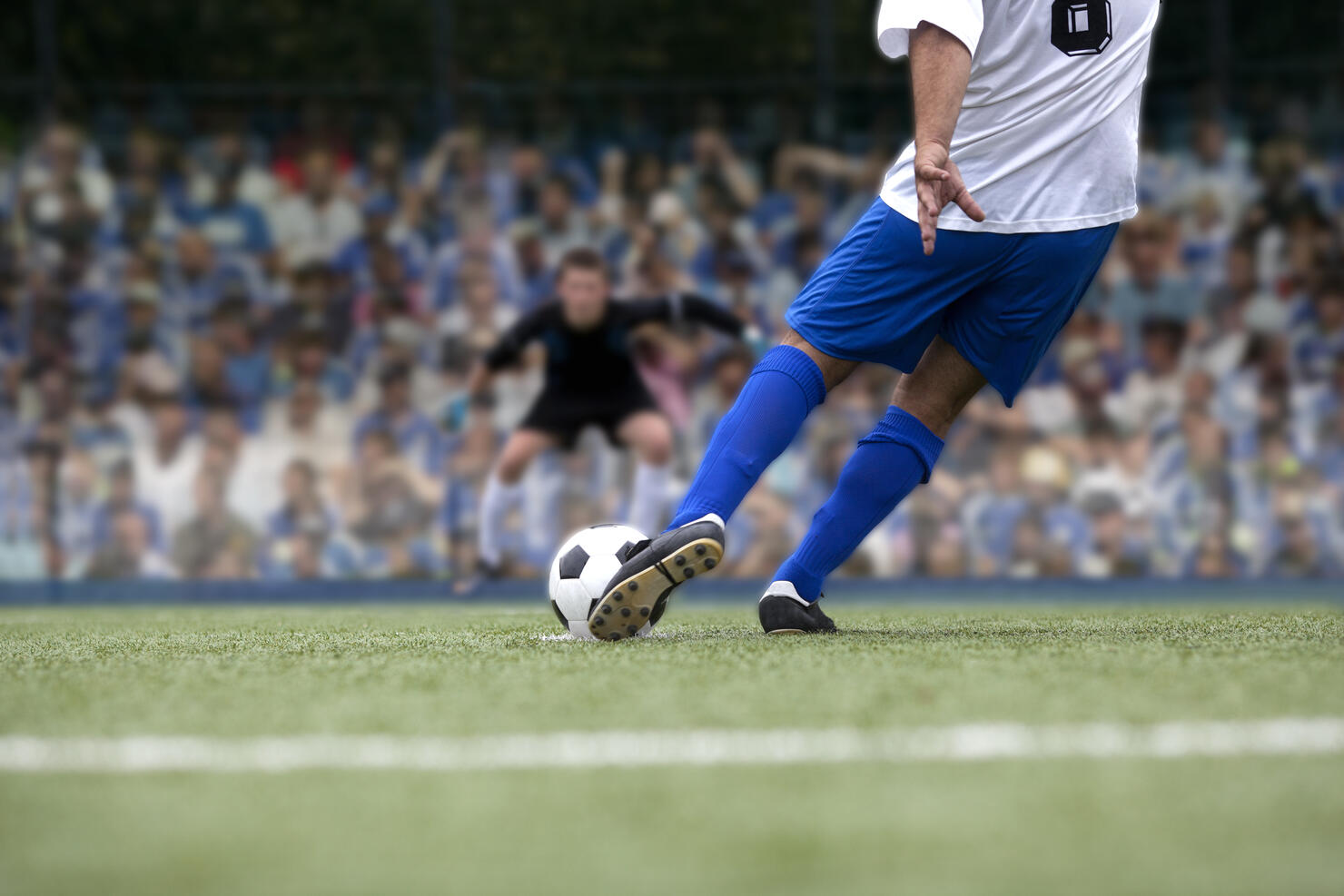 football payer shooting penalty