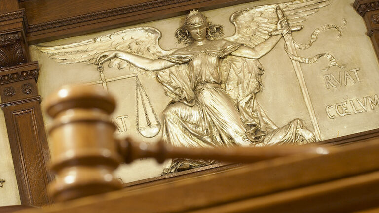 Gavel and Figure of Justice