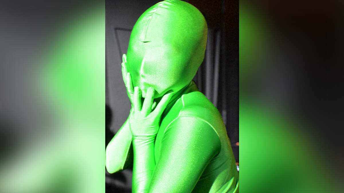 Group Of Women In Neon-Green Body Suits Wreak Havoc On New York Subway