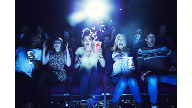 Audience enjoying movie at the cinema