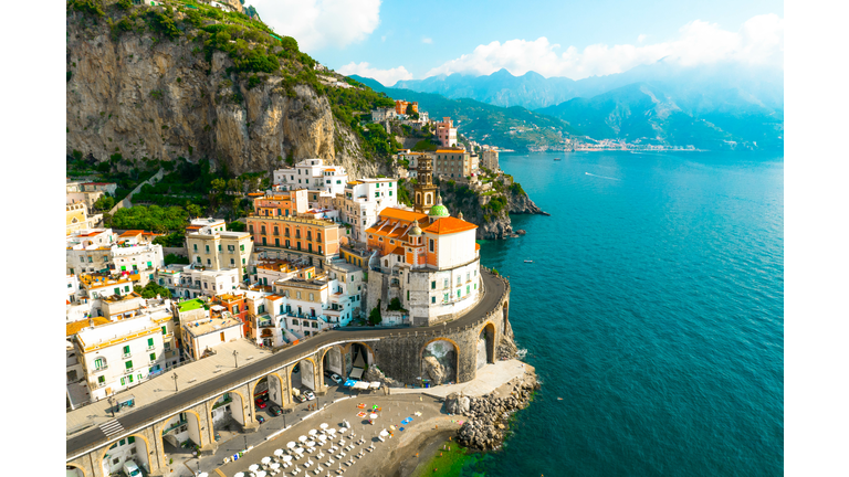 Aerial view of the stunning Amalfi coast with road and the Atrani town with arched road in Italy