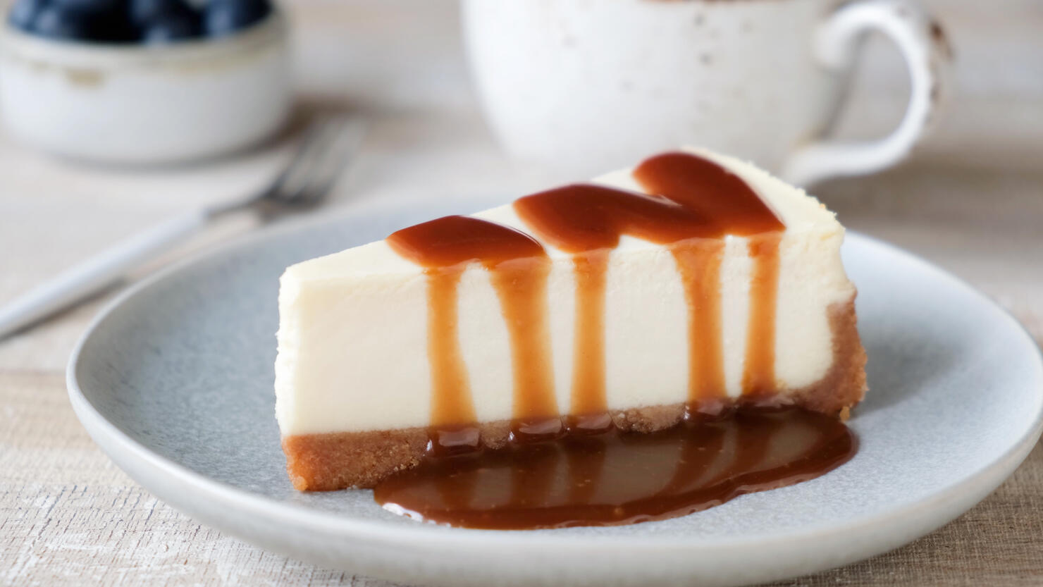 Slice of cheesecake with caramel sauce