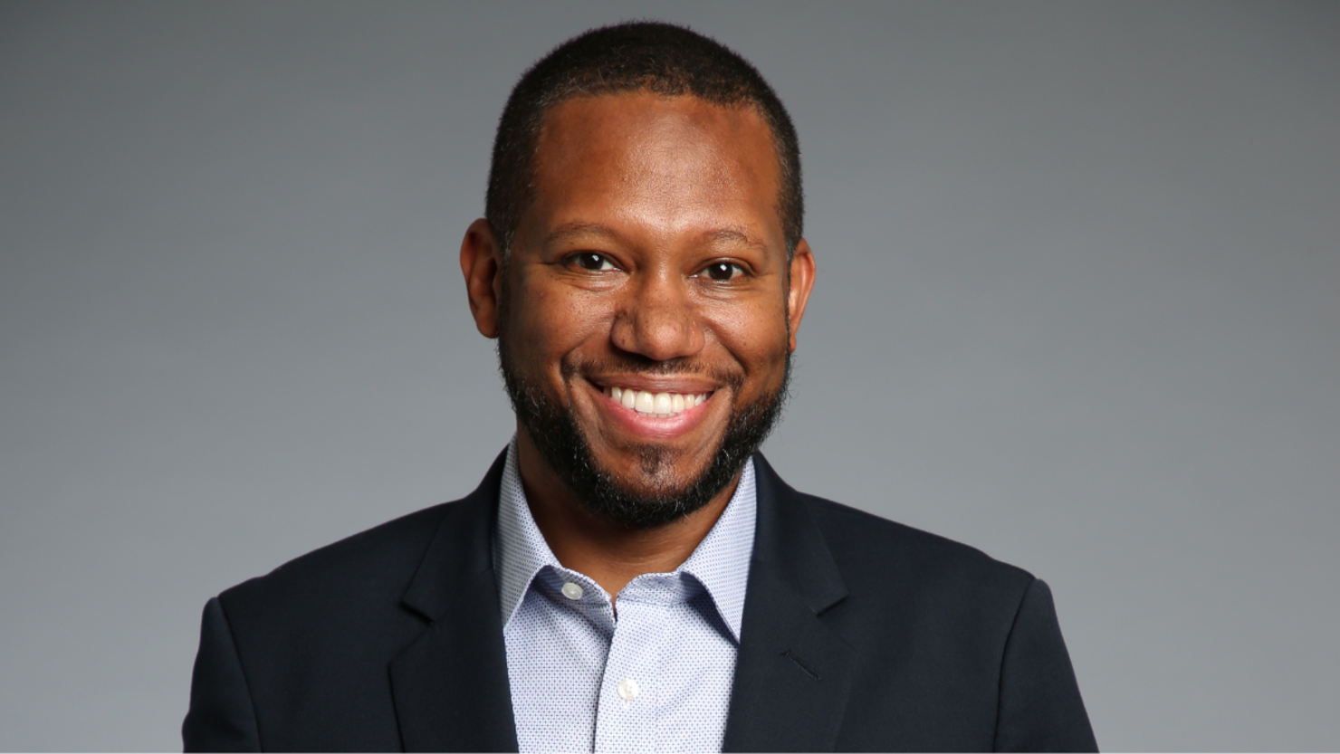 Smiling man wearing suit