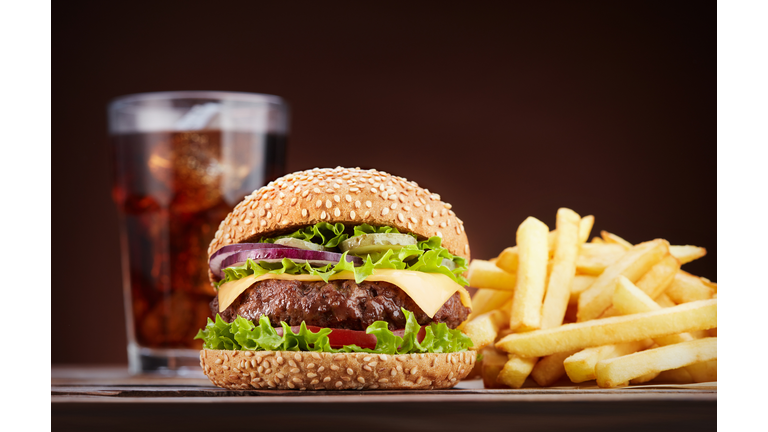 cheeseburger with cola and french fries