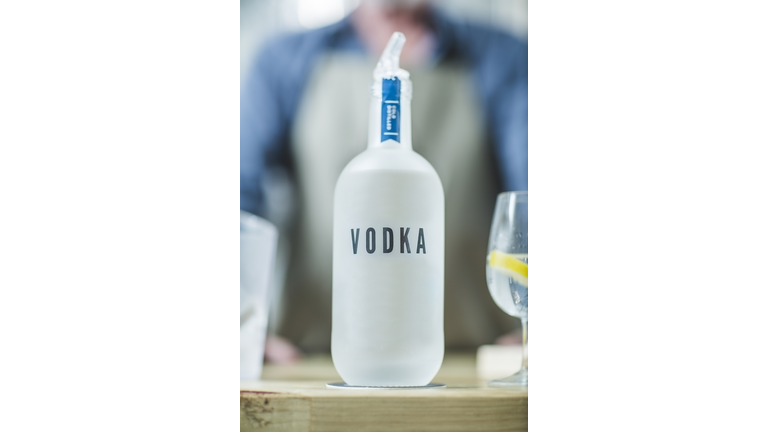 Bottle of vodka in distillery