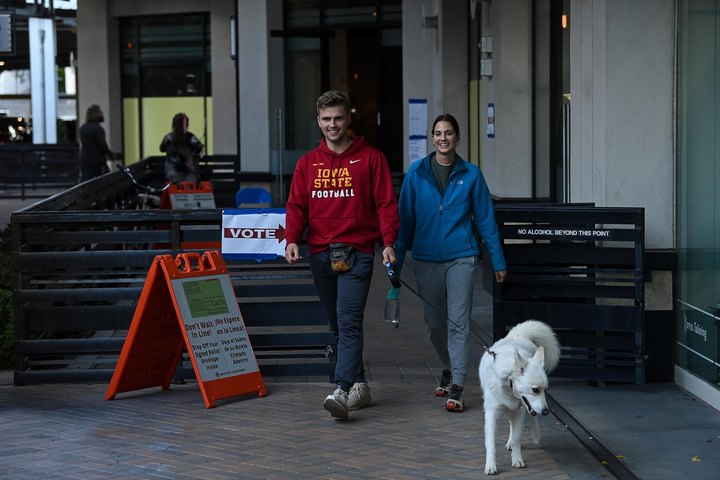 People Are Seen Outside A Polling Station At The Biltmore Fashion Park In Phoenix, Arizona