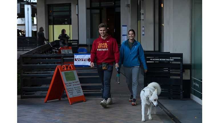 People Are Seen Outside A Polling Station At The Biltmore Fashion Park In Phoenix, Arizona