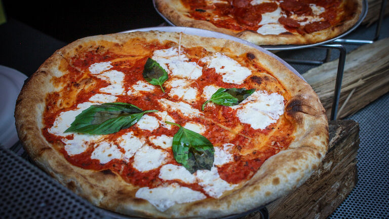 Pizza with basil and fresh mozzarella