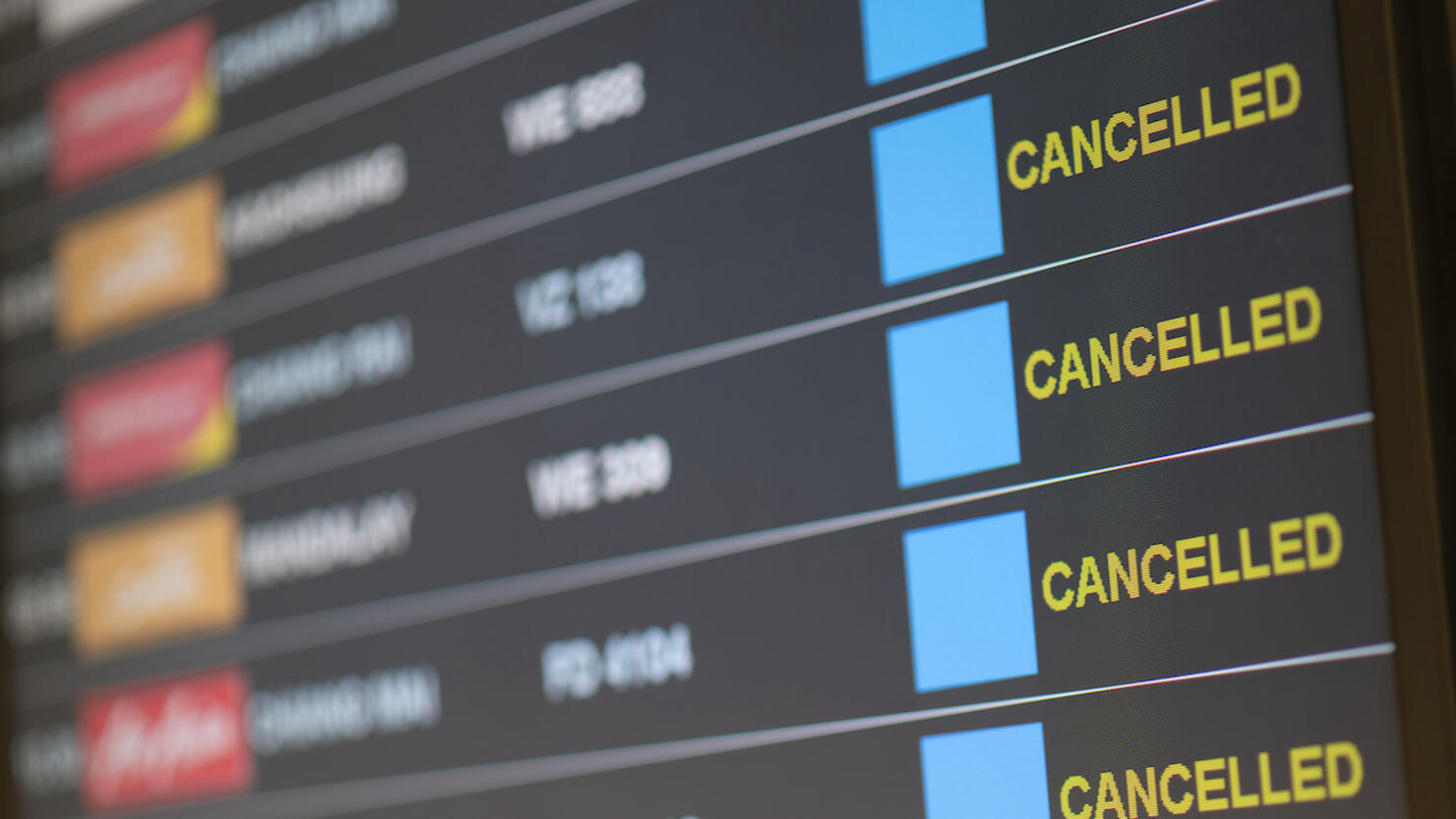 Departure flight board with cancelation at the Airport.