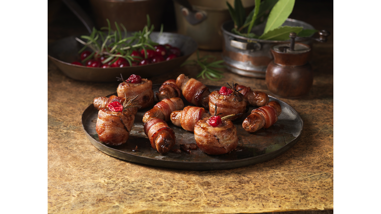 Christmas, celebration food, garnish selection, pigs in blankets, cranberries, rosemary