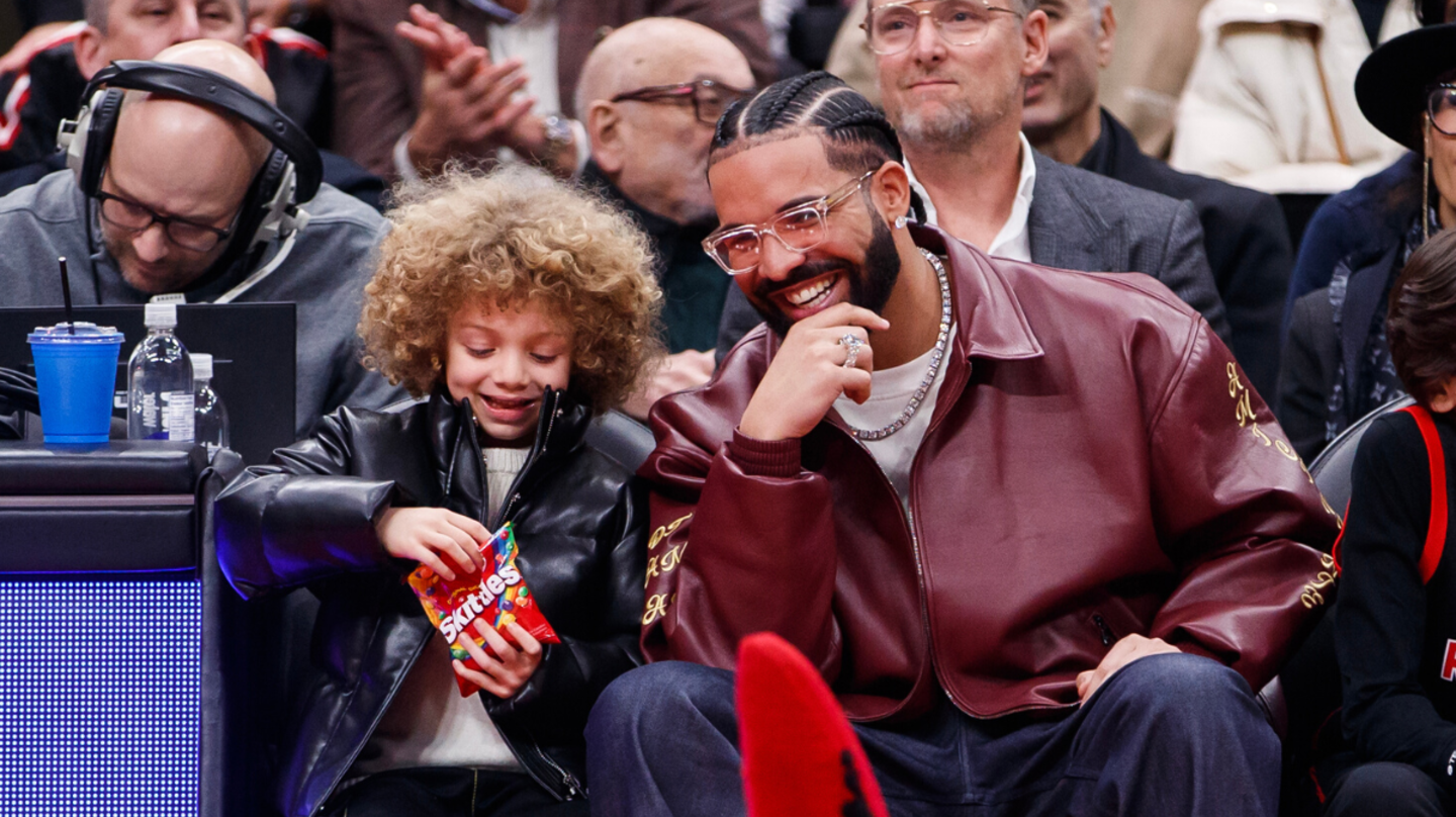 Drake & Son Adonis Rock Matching Jackets & Kicks At Raptors Game
