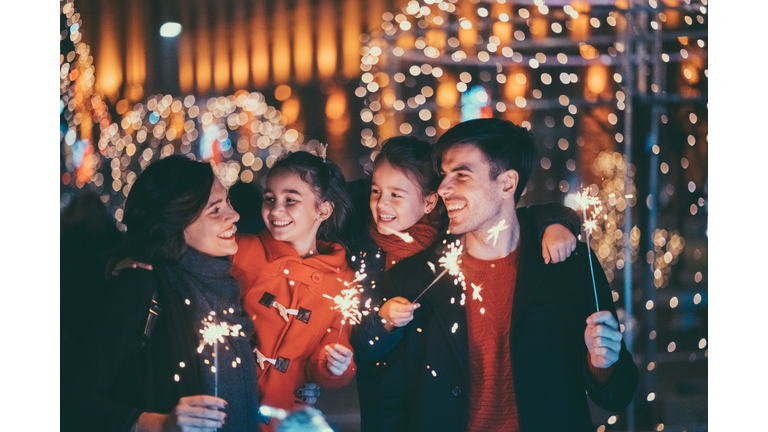 Happy family celebrating Christmas and New Year together