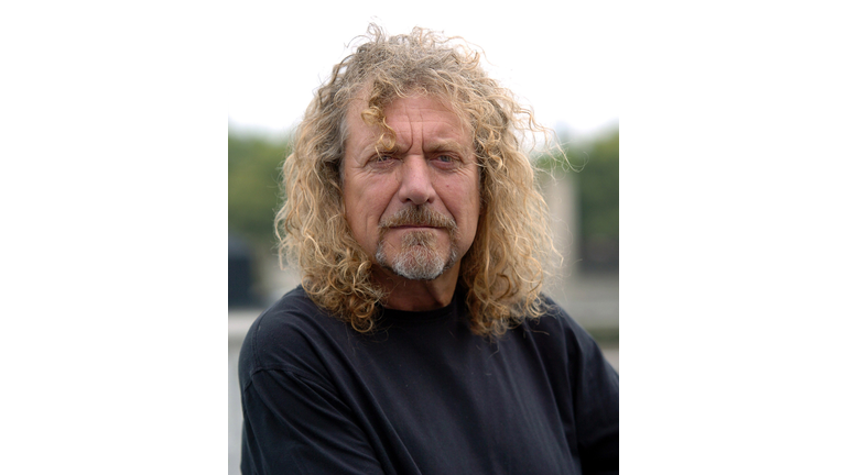 Robert Plant Signs His 10 Foot Gibson Les Paul Guitar