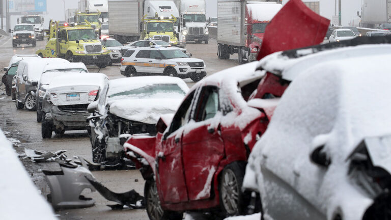 Winter Returns To Chicago With April Snow Fall