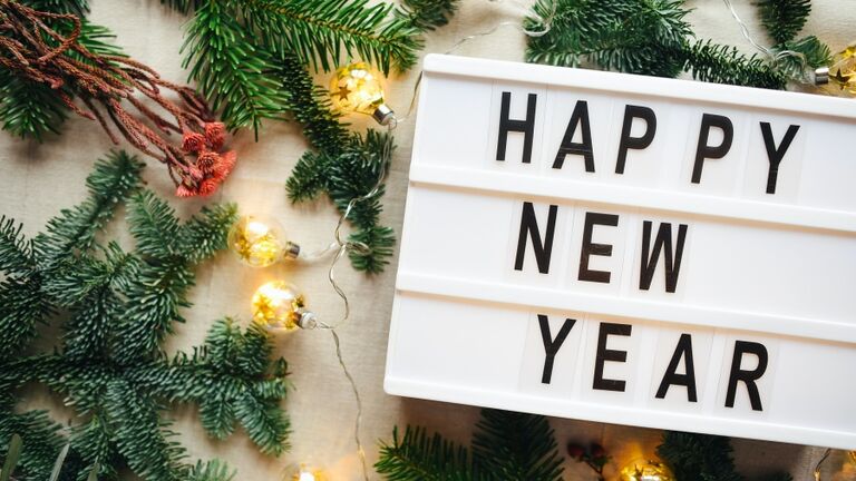 Lightbox with inscription happy new year. Christmas. Festive background.